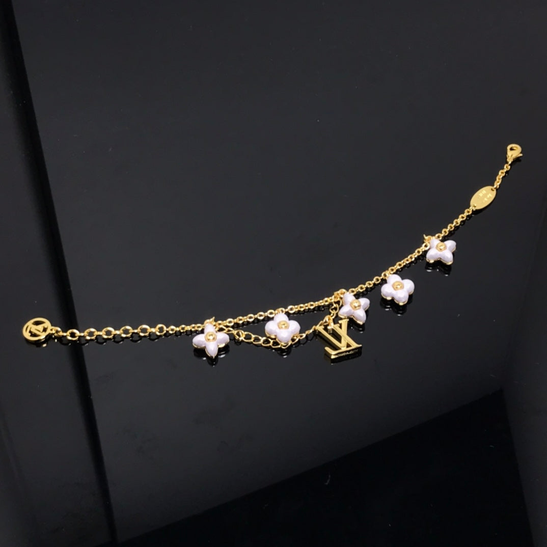 Armband LOGO 6 MOTIV STERN UND SONNE GOLD