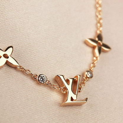 [Leaves]STAR AND SUN 7 MOTIFS GOLD BRACELET