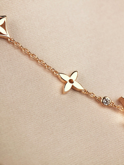 [Leaves]STAR AND SUN 7 MOTIFS GOLD BRACELET