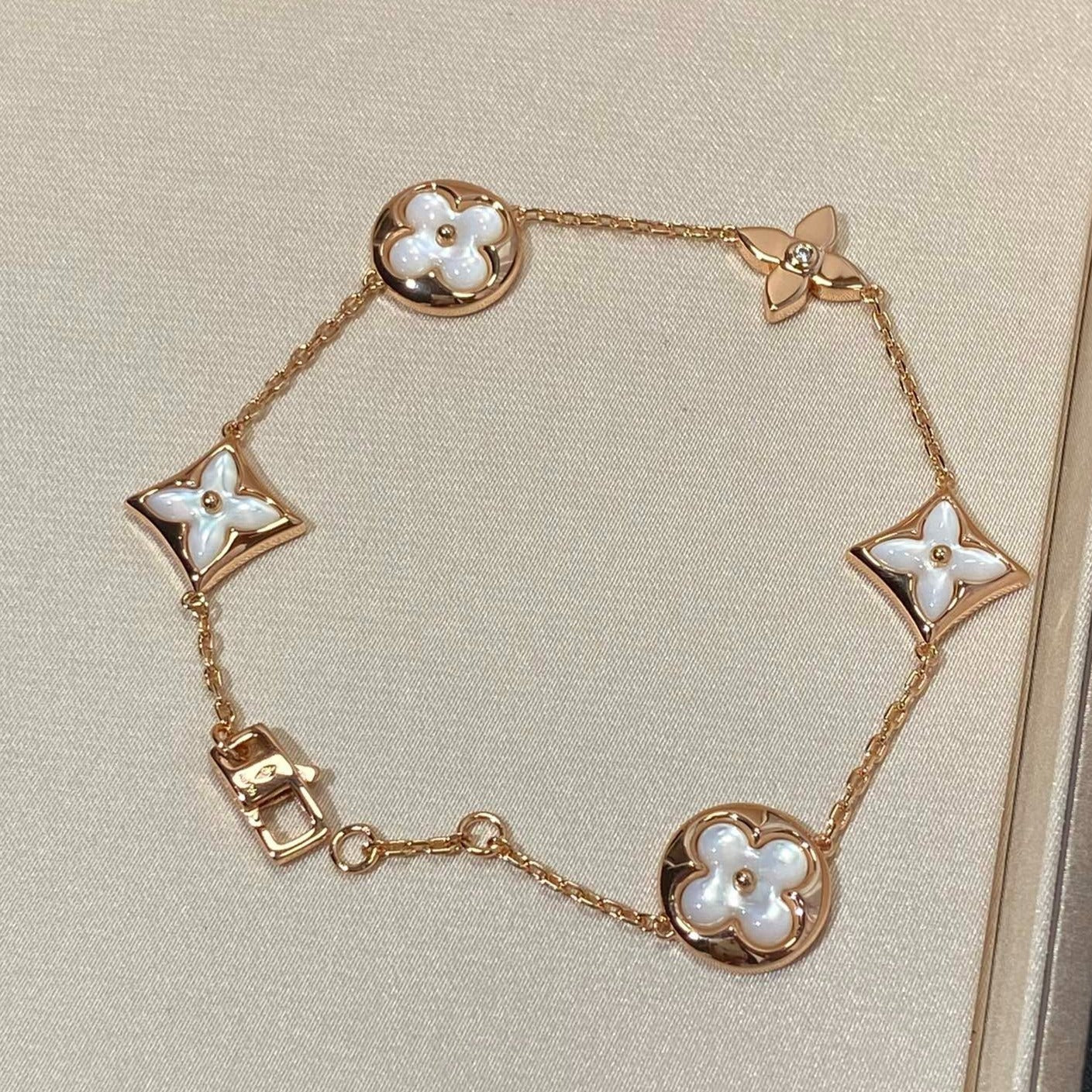 [Leaves]STAR AND SUN 5 MOTIF MOP ROSE GOLD BRACELET