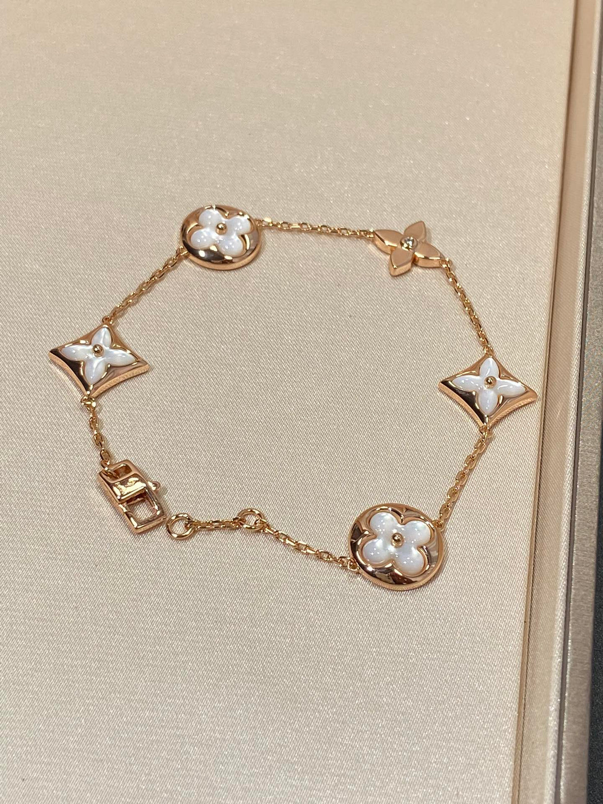 [Leaves]STAR AND SUN 5 MOTIF MOP PINK GOLD BRACELET