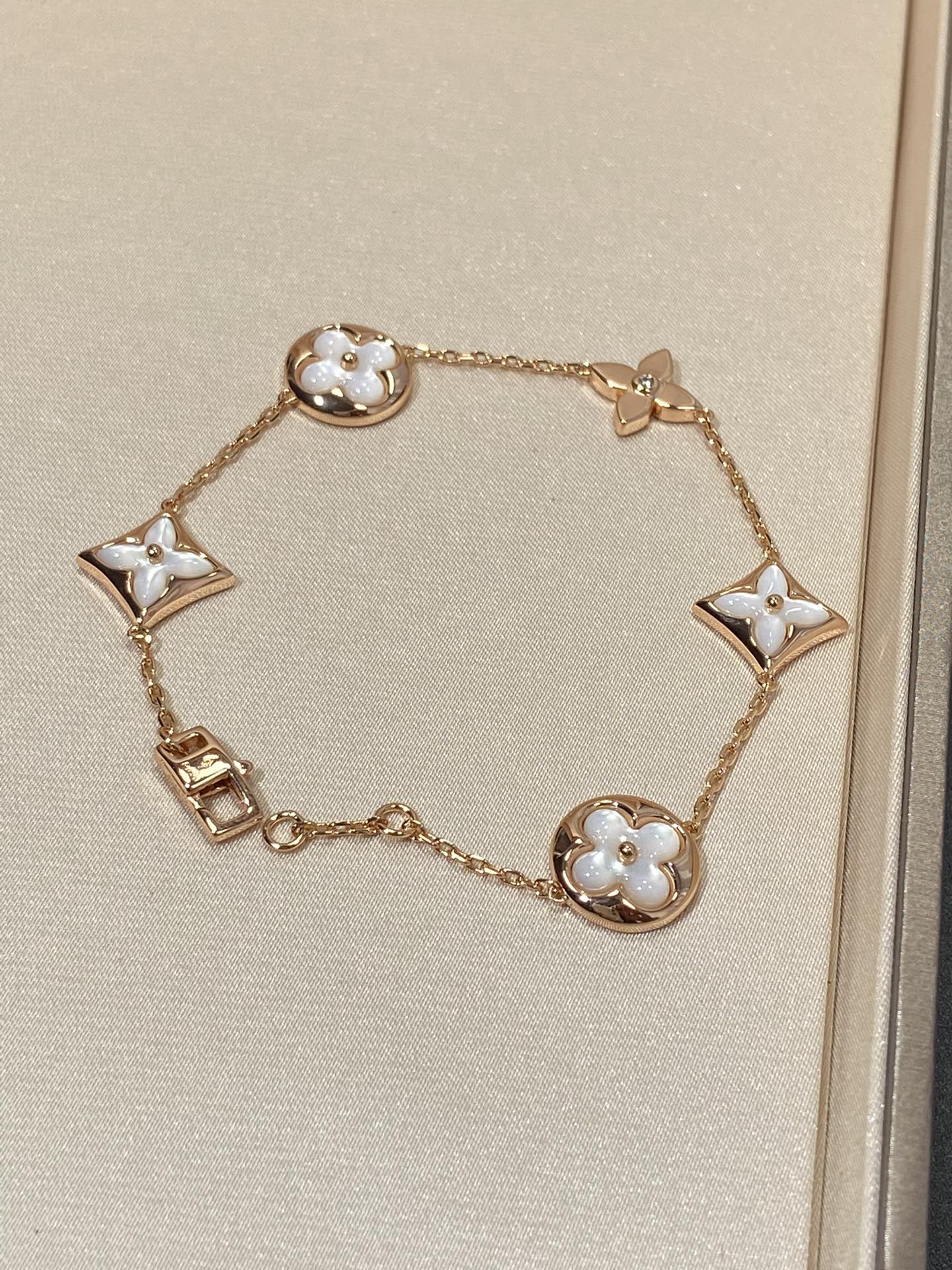 [Leaves]STAR AND SUN 5 MOTIF MOP ROSE GOLD BRACELET