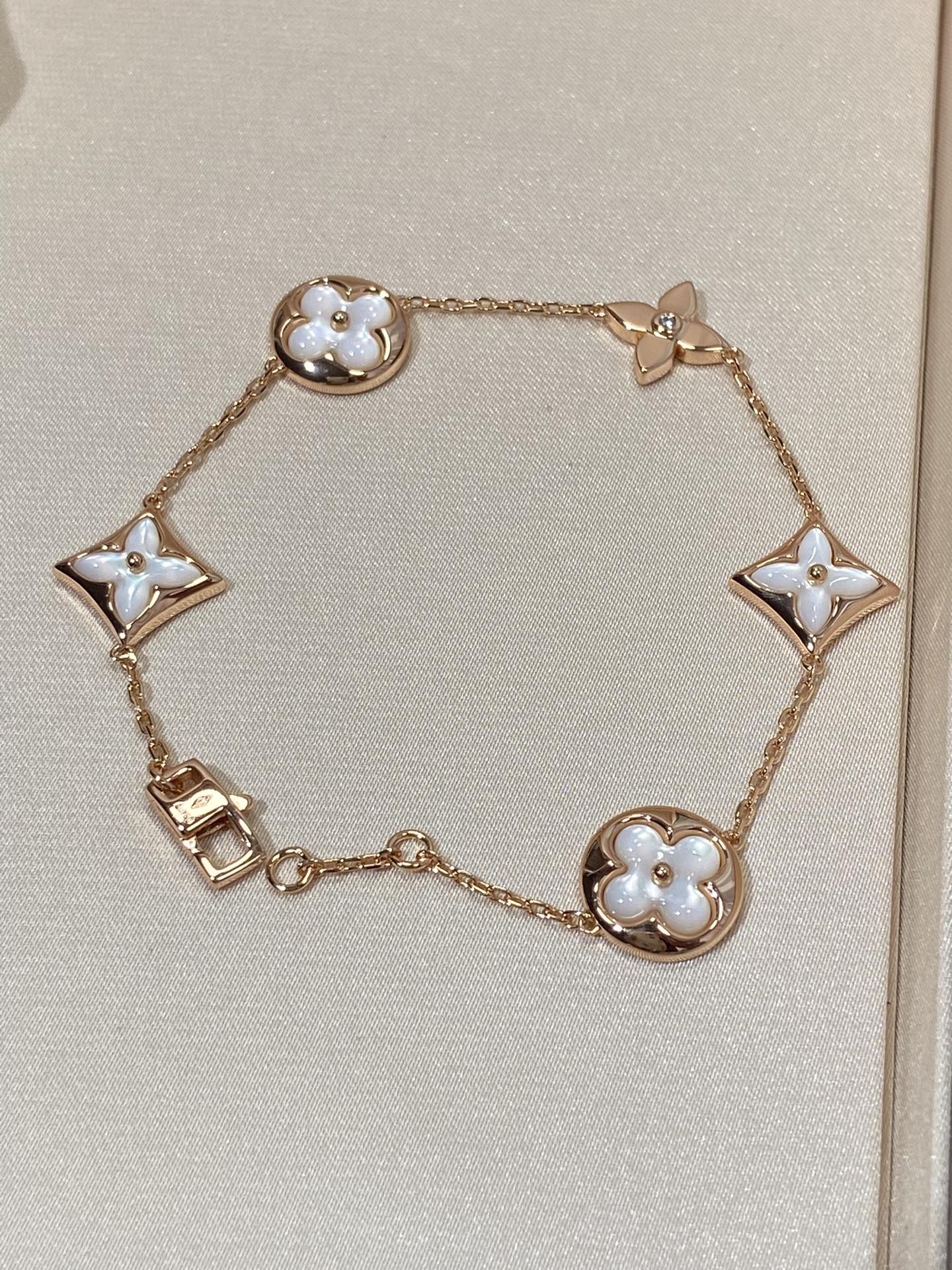 [Leaves]STAR AND SUN 5 MOTIF MOP ROSE GOLD BRACELET
