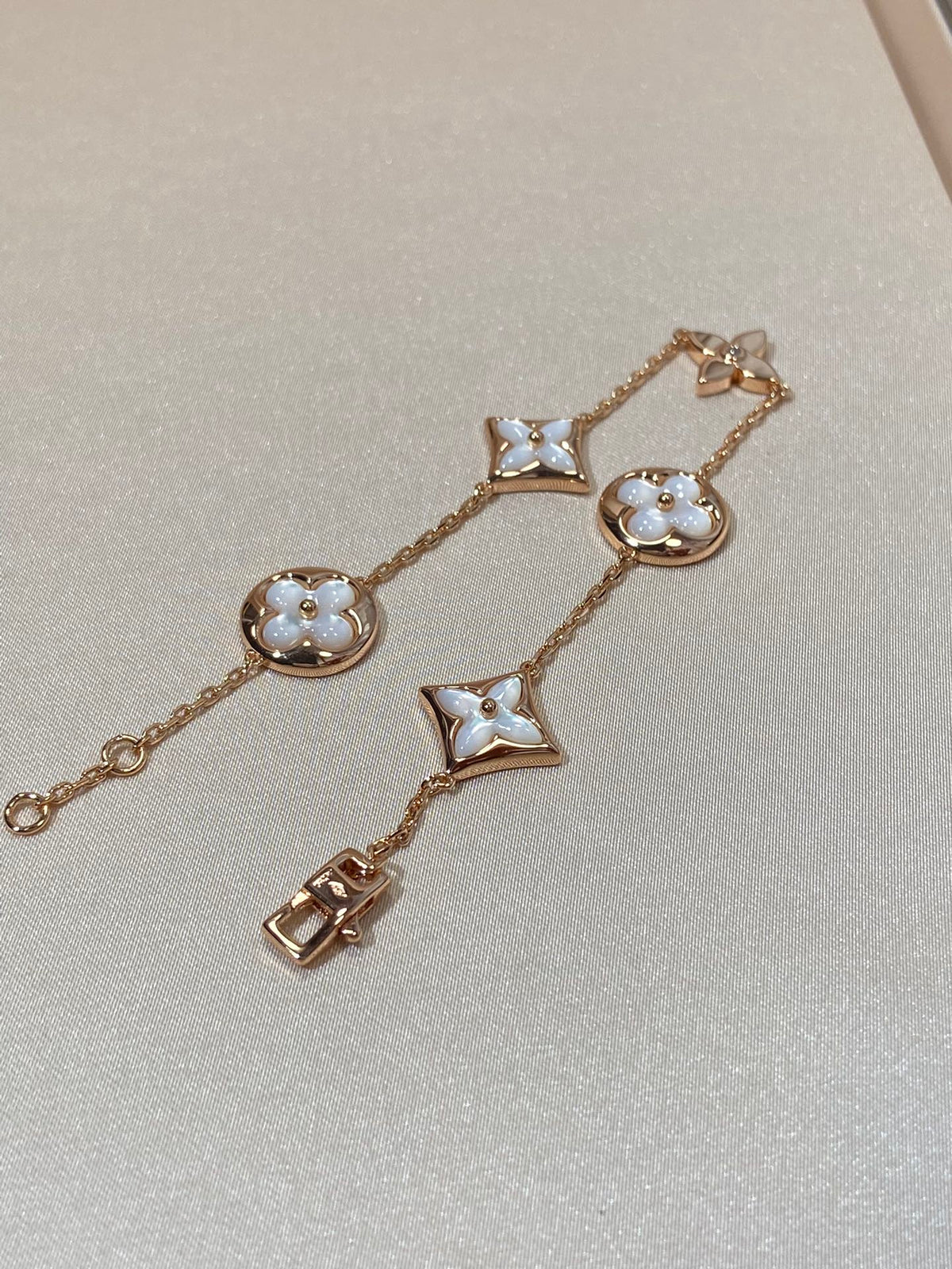[Leaves]STAR AND SUN 5 MOTIF MOP PINK GOLD BRACELET