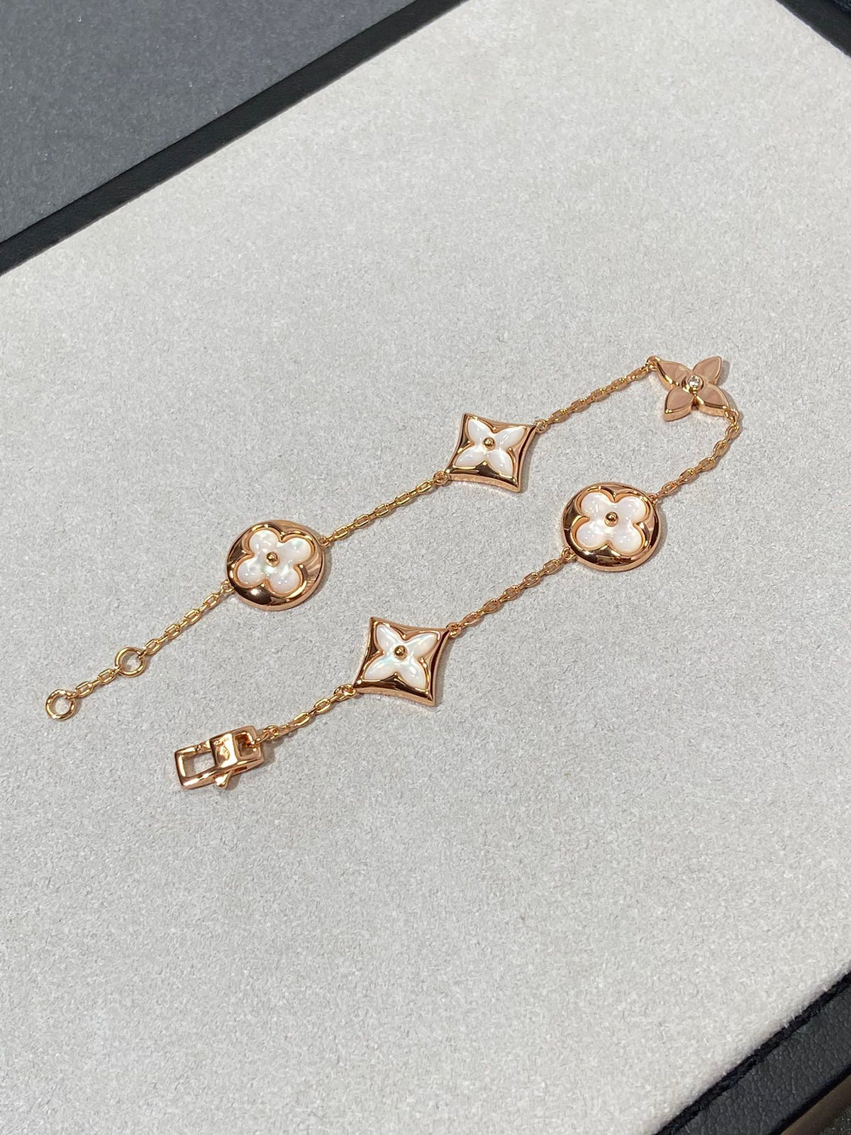 [Leaves]STAR AND SUN 5 MOTIF MOP PINK GOLD BRACELET