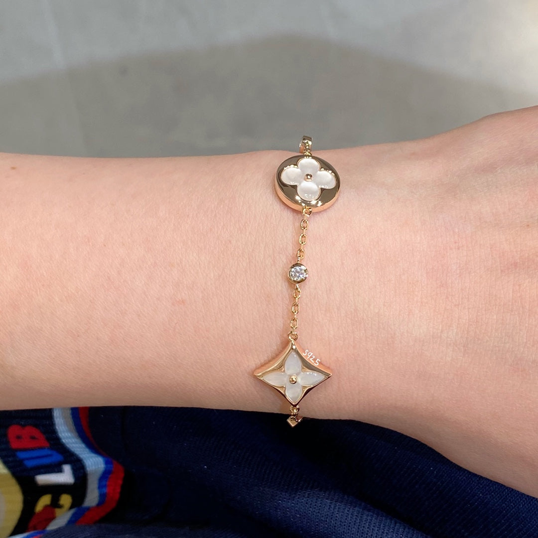 [Leaves]STAR AND SUN 4 MOTIF WHITE MOP ROSE GOLD BRACELET