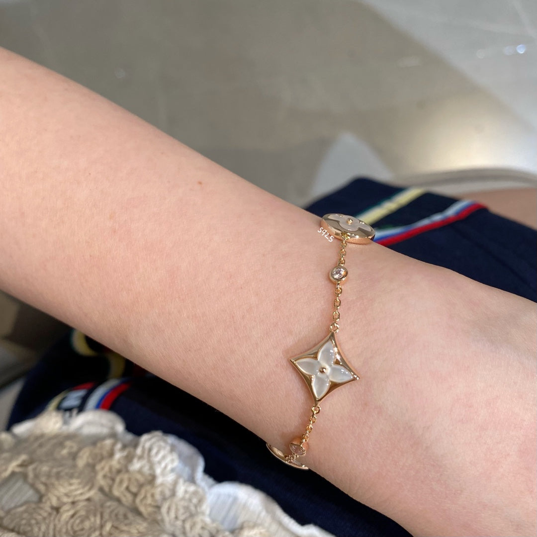 [Leaves]STAR AND SUN 4 MOTIF WHITE MOP ROSE GOLD BRACELET