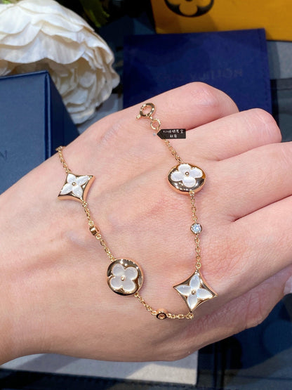 [Leaves]STAR AND SUN 4 MOTIF WHITE MOP ROSE GOLD BRACELET