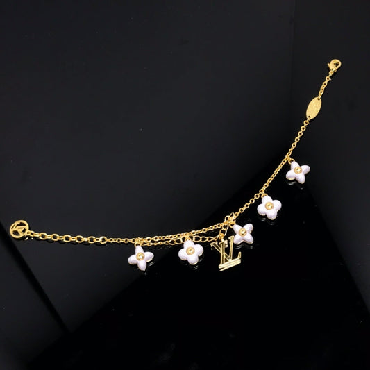 [Leaves]LOGO 6 MOTIF STAR AND SUN GOLD BRACELET
