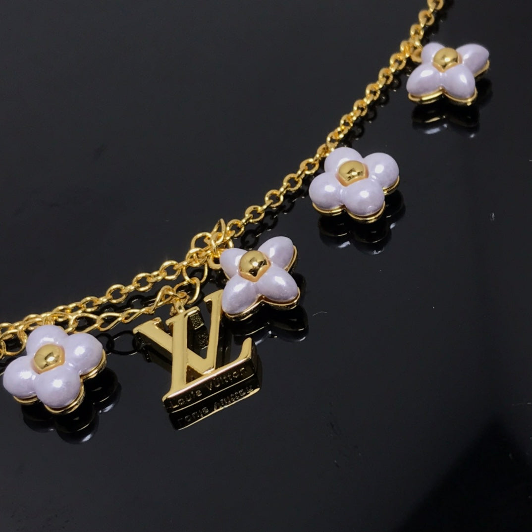 [Leaves]LOGO 6 MOTIF STAR AND SUN GOLD BRACELET
