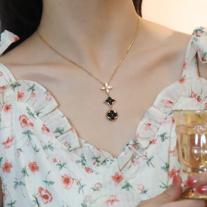 [Leaves]STAR AND SUN ONYX ROSE GOLD NECKLACE