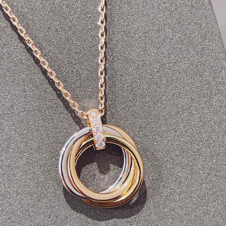 [Leaves]TRINITY NECKLACE GOLD  DIAMONDS